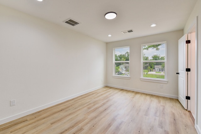 8149 Talton St B, Unit A, Houston, TX 77028 - spare room featuring light wood-style flooring, baseboards, and recessed lighting
