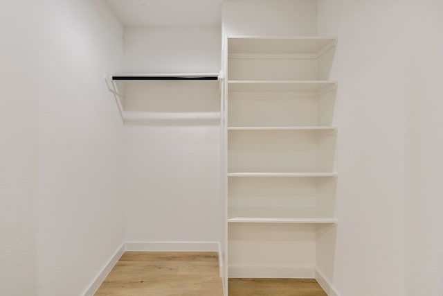 8149 Talton St B, Unit A, Houston, TX 77028 - walk in closet with wood finished floors