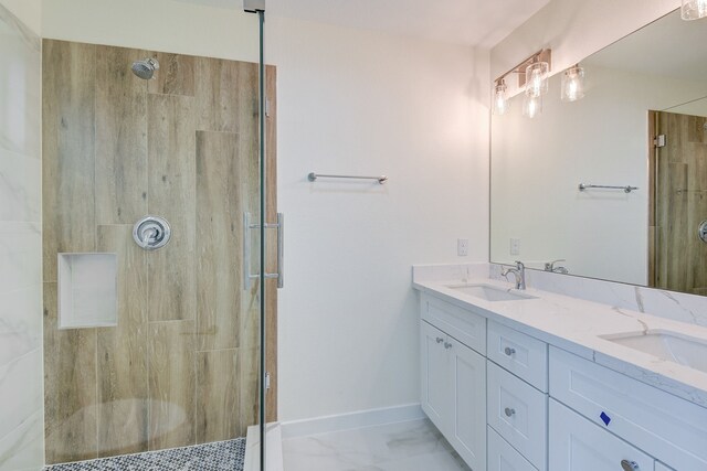 8149 Talton St B, Unit A, Houston, TX 77028 - full bath featuring a shower stall, double vanity, marble finish floors, and baseboards