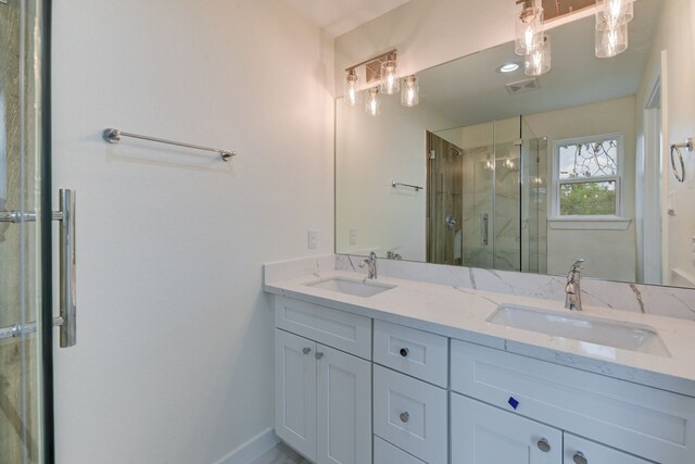 8149 Talton St B, Unit A, Houston, TX 77028 - full bath featuring double vanity, a marble finish shower, and baseboards