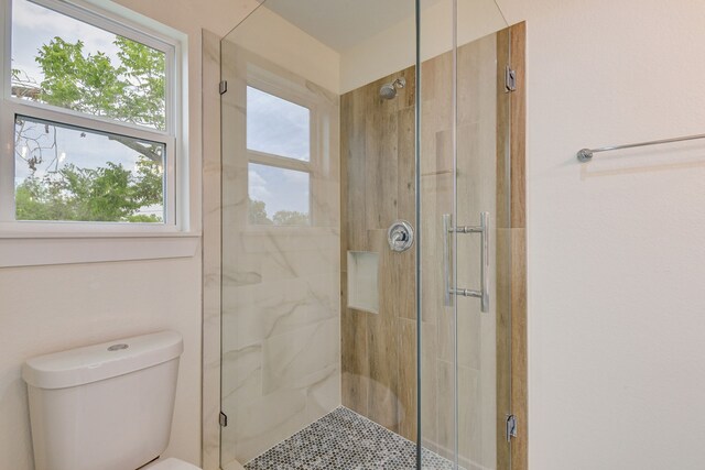 8149 Talton St B, Unit A, Houston, TX 77028 - bathroom featuring a shower stall and toilet