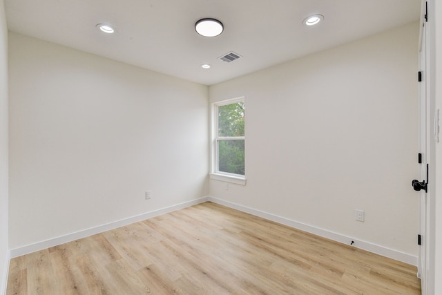 8149 Talton St B, Unit A, Houston, TX 77028 - unfurnished room featuring light wood finished floors, baseboards, and recessed lighting