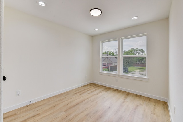 8149 Talton St B, Unit A, Houston, TX 77028 - empty room with wood finished floors, baseboards, and recessed lighting