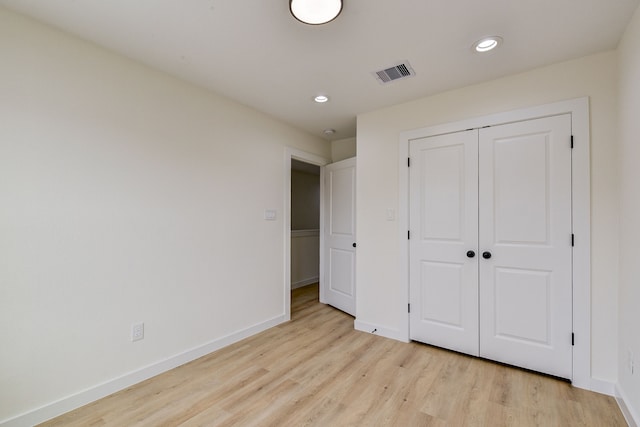 8149 Talton St B, Unit A, Houston, TX 77028 - unfurnished bedroom featuring baseboards, light wood finished floors, recessed lighting, and a closet