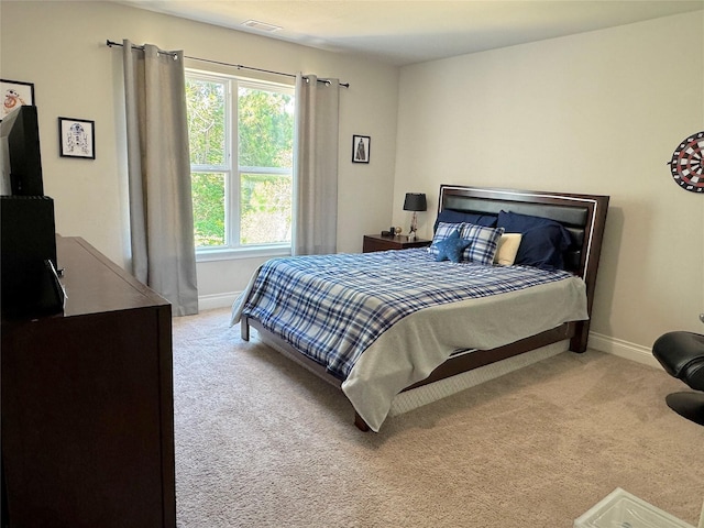 201 Deen Dr, Houston, TX 77336 - bedroom with carpet flooring and baseboards