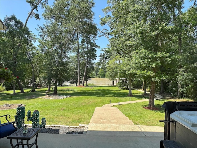 201 Deen Dr, Houston, TX 77336 - view of grassy yard with a hot tub