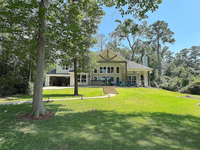 201 Deen Dr, Houston, TX 77336 - rear view of property with a chimney and a lawn
