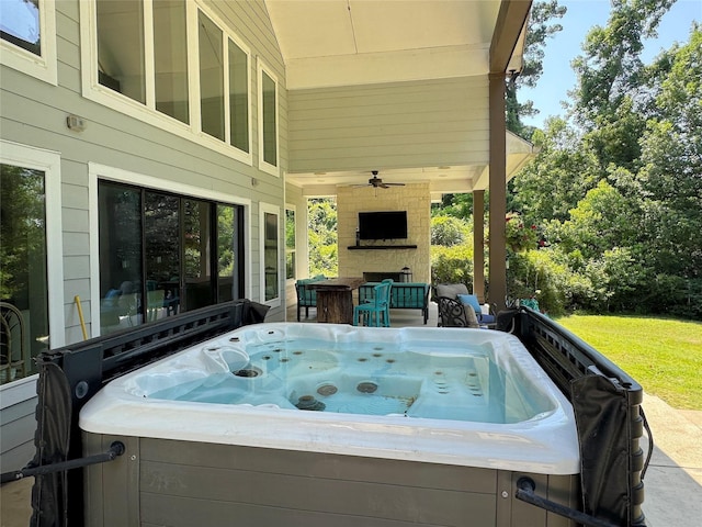 201 Deen Dr, Houston, TX 77336 - view of patio with a hot tub and a ceiling fan