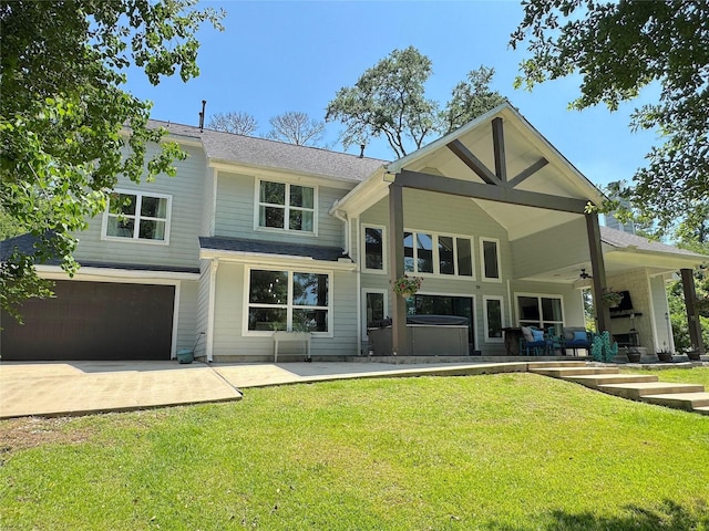 201 Deen Dr, Houston, TX 77336 - rear view of property with a hot tub, a patio, ceiling fan, a yard, and roof with shingles