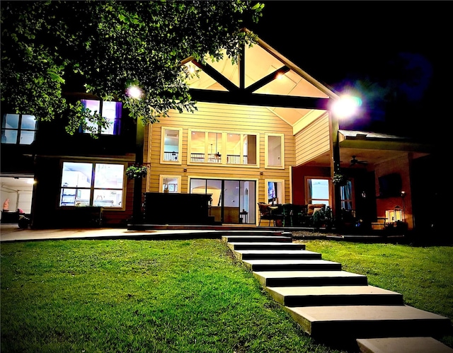 201 Deen Dr, Houston, TX 77336 - back of house featuring a lawn and ceiling fan