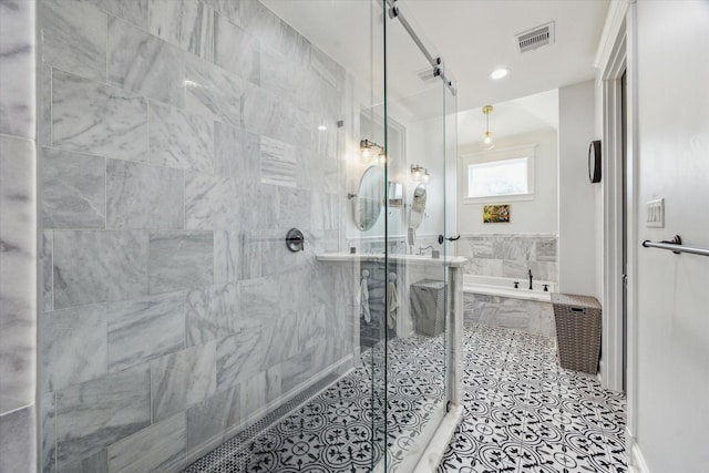 1212 Bingham St, Houston, TX 77007 - full bathroom with a bath, a shower stall, and tile patterned flooring