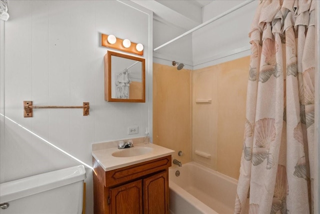 227 Detenbeck Ave, Surfside Beach, TX 77541 - bathroom featuring shower / bath combo with shower curtain, toilet, and vanity