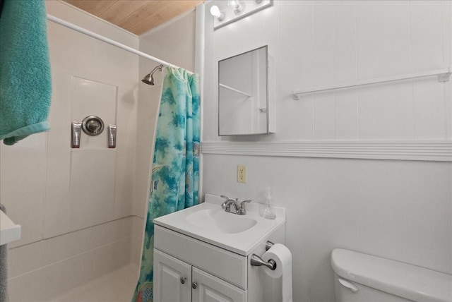 227 Detenbeck Ave, Surfside Beach, TX 77541 - bathroom featuring vanity, toilet, a shower with shower curtain, and wooden ceiling