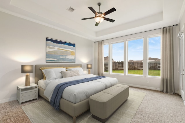 5204 Andorra Bend Ln, Porter, TX 77365 - bedroom with a tray ceiling, light colored carpet, baseboards, and ceiling fan