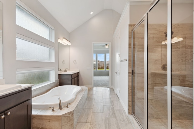 5204 Andorra Bend Ln, Porter, TX 77365 - full bath with vanity, a garden tub, a stall shower, a ceiling fan, and baseboards