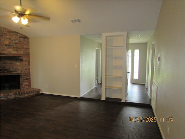 16114 Forest Bend Ave, Friendswood, TX 77546 - unfurnished living room with hardwood / wood-style flooring, a ceiling fan, baseboards, a fireplace, and vaulted ceiling
