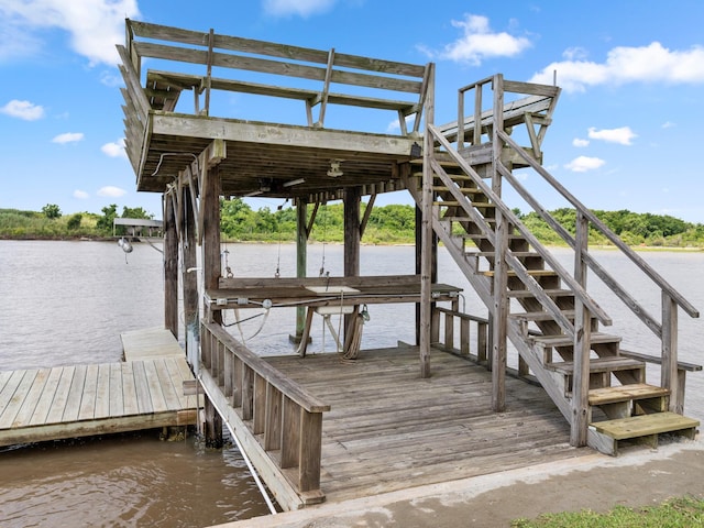 779 County Road 257, Matagorda, TX 77457 - dock featuring a water view and boat lift