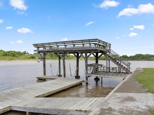 779 County Road 257, Matagorda, TX 77457 - dock featuring a water view
