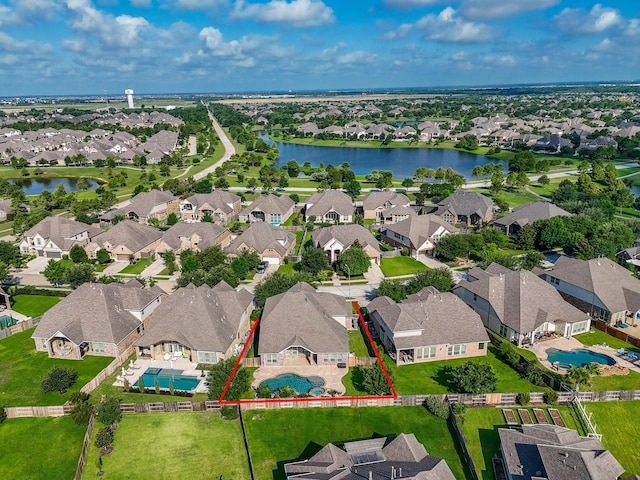 17218 Meek Pass Dr, Cypress, TX 77433 - aerial perspective of suburban area with property parcel outlined, a pool area, and a large body of water