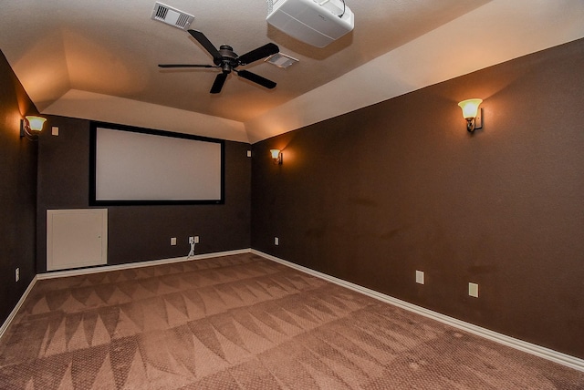 17218 Meek Pass Dr, Cypress, TX 77433 - carpeted cinema room featuring a ceiling fan, baseboards, and vaulted ceiling