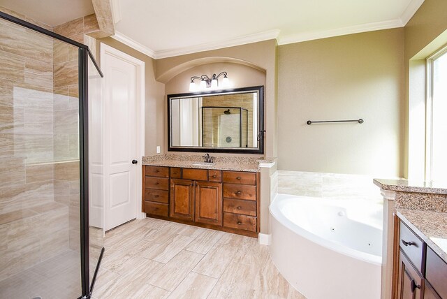 17218 Meek Pass Dr, Cypress, TX 77433 - bathroom featuring a shower stall, vanity, ornamental molding, and a tub with jets