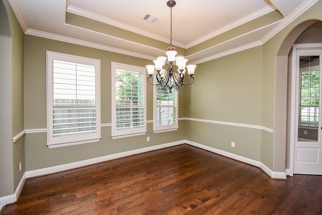17218 Meek Pass Dr, Cypress, TX 77433 - empty room featuring dark wood finished floors, healthy amount of natural light, a chandelier, a raised ceiling, and ornamental molding