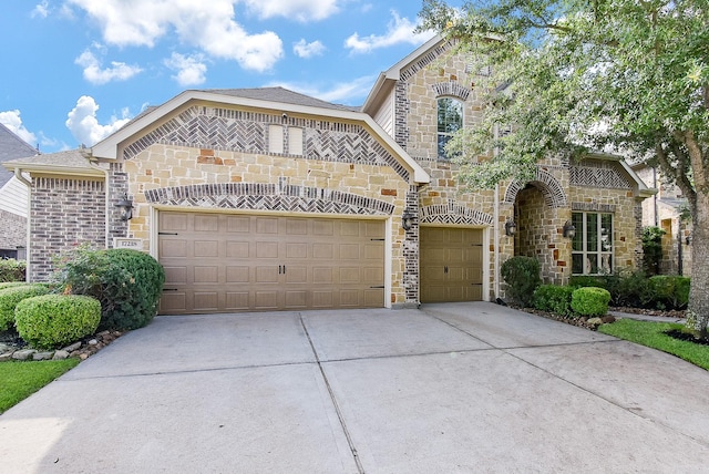 17218 Meek Pass Dr, Cypress, TX 77433 - french provincial home featuring stone siding, driveway, and a garage