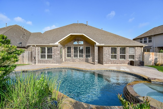 17218 Meek Pass Dr, Cypress, TX 77433 - view of pool featuring a patio area and a pool with connected hot tub