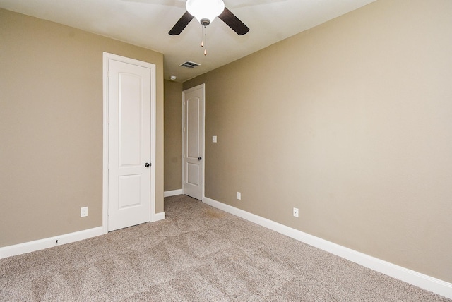 17218 Meek Pass Dr, Cypress, TX 77433 - empty room with ceiling fan, light carpet, and baseboards