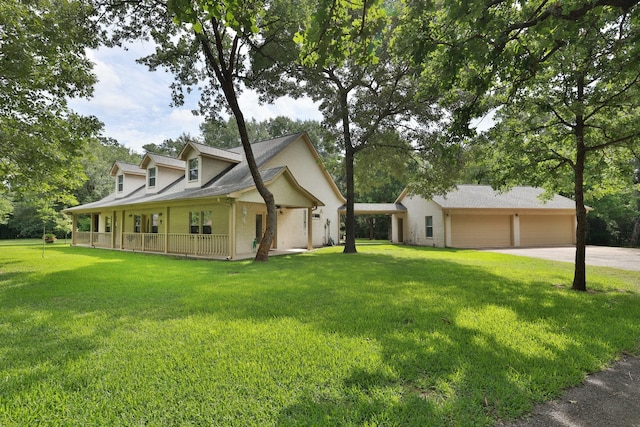 23302 Green Forest St, Hockley, TX 77447 - view of property exterior featuring a porch, a lawn, a garage, and concrete driveway