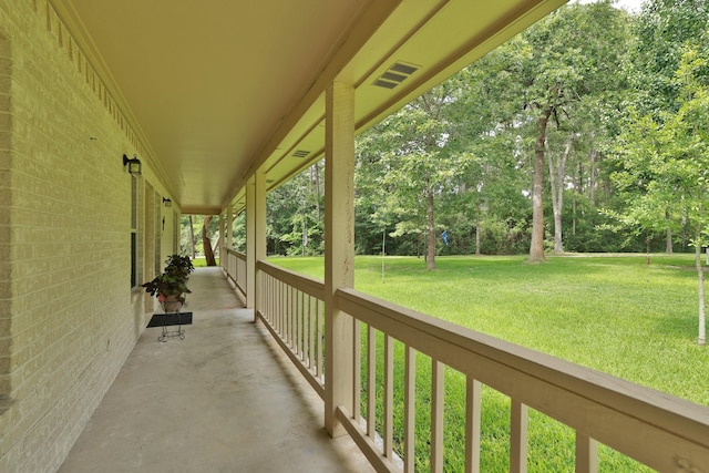 23302 Green Forest St, Hockley, TX 77447 - porch featuring a yard and view of scattered trees