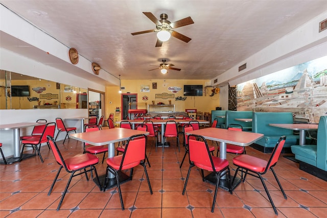 1309 1st St, La Marque, TX 77568 - tiled dining area with ceiling fan