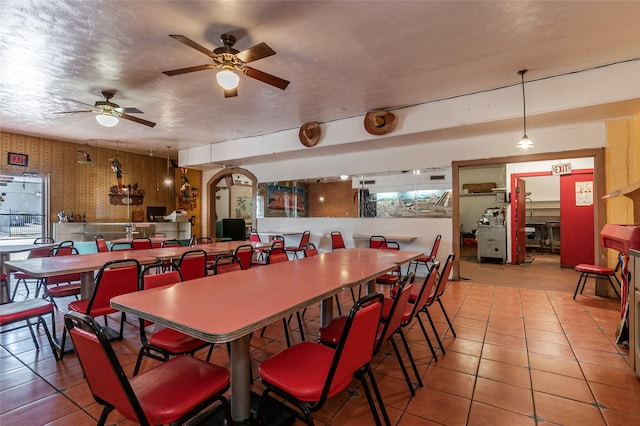 1309 1st St, La Marque, TX 77568 - dining space with a ceiling fan and tile patterned floors