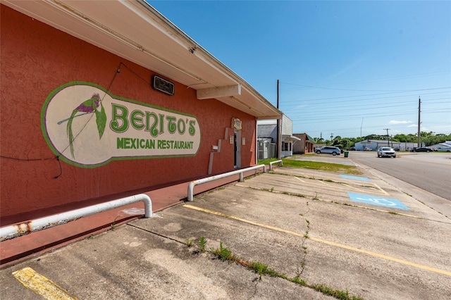 1309 1st St, La Marque, TX 77568 - exterior view of parking and stucco siding