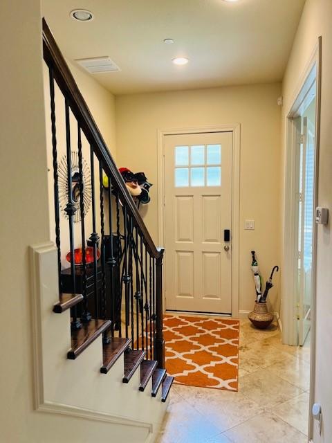 2533 Lamar St, Houston, TX 77003 - foyer featuring stairs, recessed lighting, and tile patterned flooring