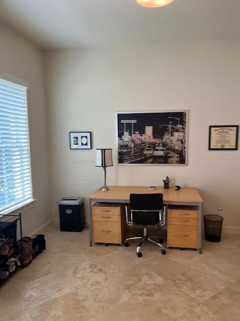 2533 Lamar St, Houston, TX 77003 - home office featuring baseboards