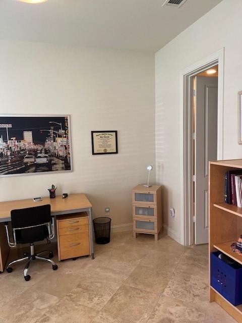 2533 Lamar St, Houston, TX 77003 - home office featuring baseboards