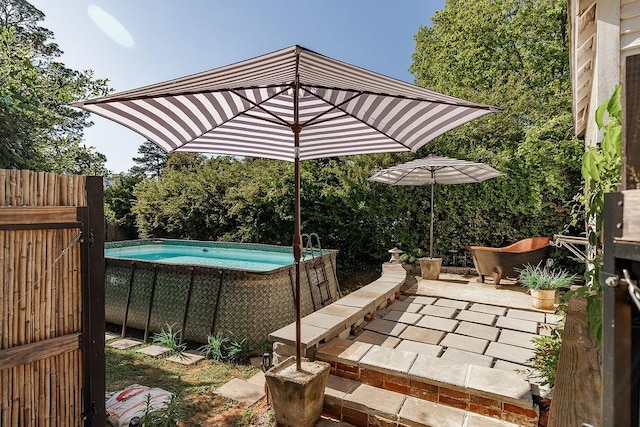 301 S Alexander Ave, Washington, GA 30673 - view of swimming pool featuring a patio
