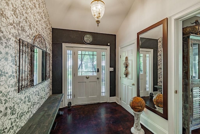 301 S Alexander Ave, Washington, GA 30673 - foyer with a chandelier, wallpapered walls, and wood finished floors