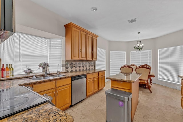 3714 Green Fields Dr, Sugar Land, TX 77479 - kitchen with dishwasher, a sink, backsplash, a chandelier, and pendant lighting