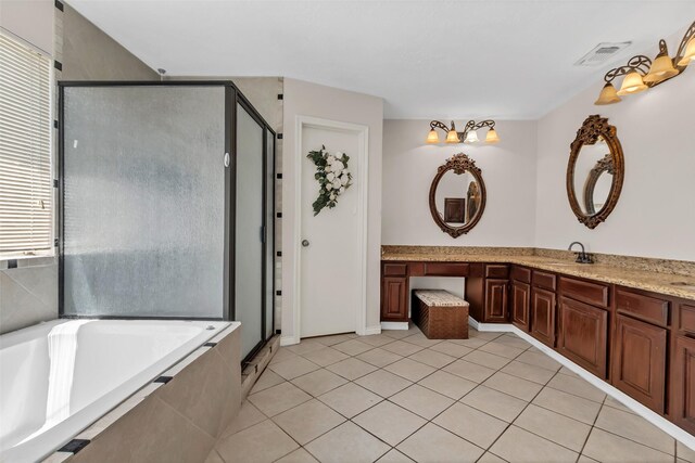 3714 Green Fields Dr, Sugar Land, TX 77479 - full bath with vanity, a garden tub, a shower stall, and tile patterned flooring