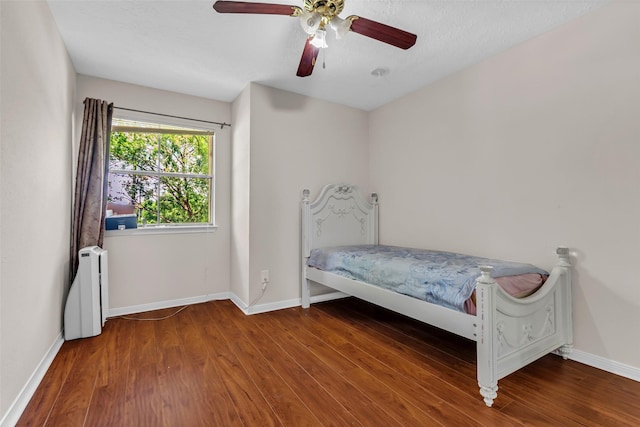 3714 Green Fields Dr, Sugar Land, TX 77479 - bedroom featuring wood finished floors, baseboards, and ceiling fan