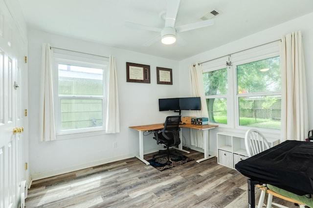 117 Tuna St, Galveston, TX 77550 - office space with wood finished floors, plenty of natural light, and ceiling fan