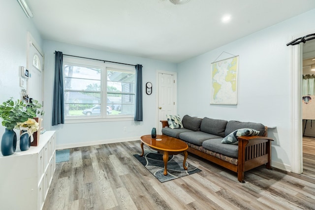 117 Tuna St, Galveston, TX 77550 - living room with light wood-style flooring