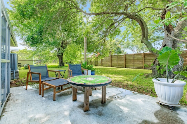 117 Tuna St, Galveston, TX 77550 - fenced backyard with a patio