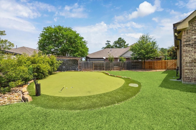 27208 Adrian Hills Ln, Spring, TX 77386 - view of yard featuring an area to practice putting
