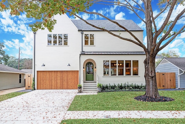 1438 Wakefield Dr, Houston, TX 77018 - traditional-style house featuring concrete driveway and an attached garage