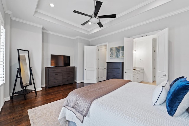 1807 Ashland St, Houston, TX 77008 - bedroom featuring wood finished floors, a raised ceiling, baseboards, ornamental molding, and ensuite bathroom