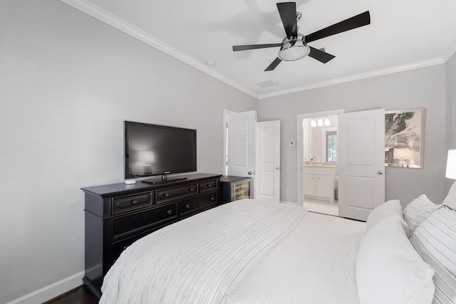 1807 Ashland St, Houston, TX 77008 - bedroom featuring crown molding, baseboards, a ceiling fan, and ensuite bath