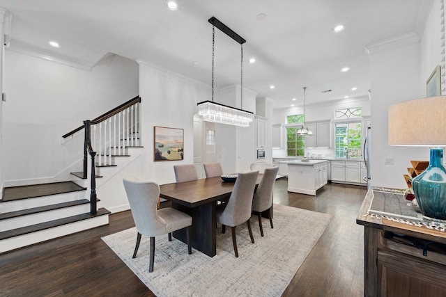 1807 Ashland St, Houston, TX 77008 - dining area featuring ornamental molding, stairs, dark wood-style flooring, and recessed lighting